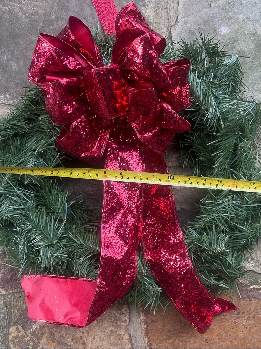 Festive Green Holiday Wreath with Sparkling Red Bow